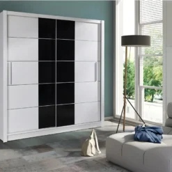 Armoire Collection BRESCIA, 2 Portes Coulissantes Coloris Noir Et Blanc, Penderie Intégrée.